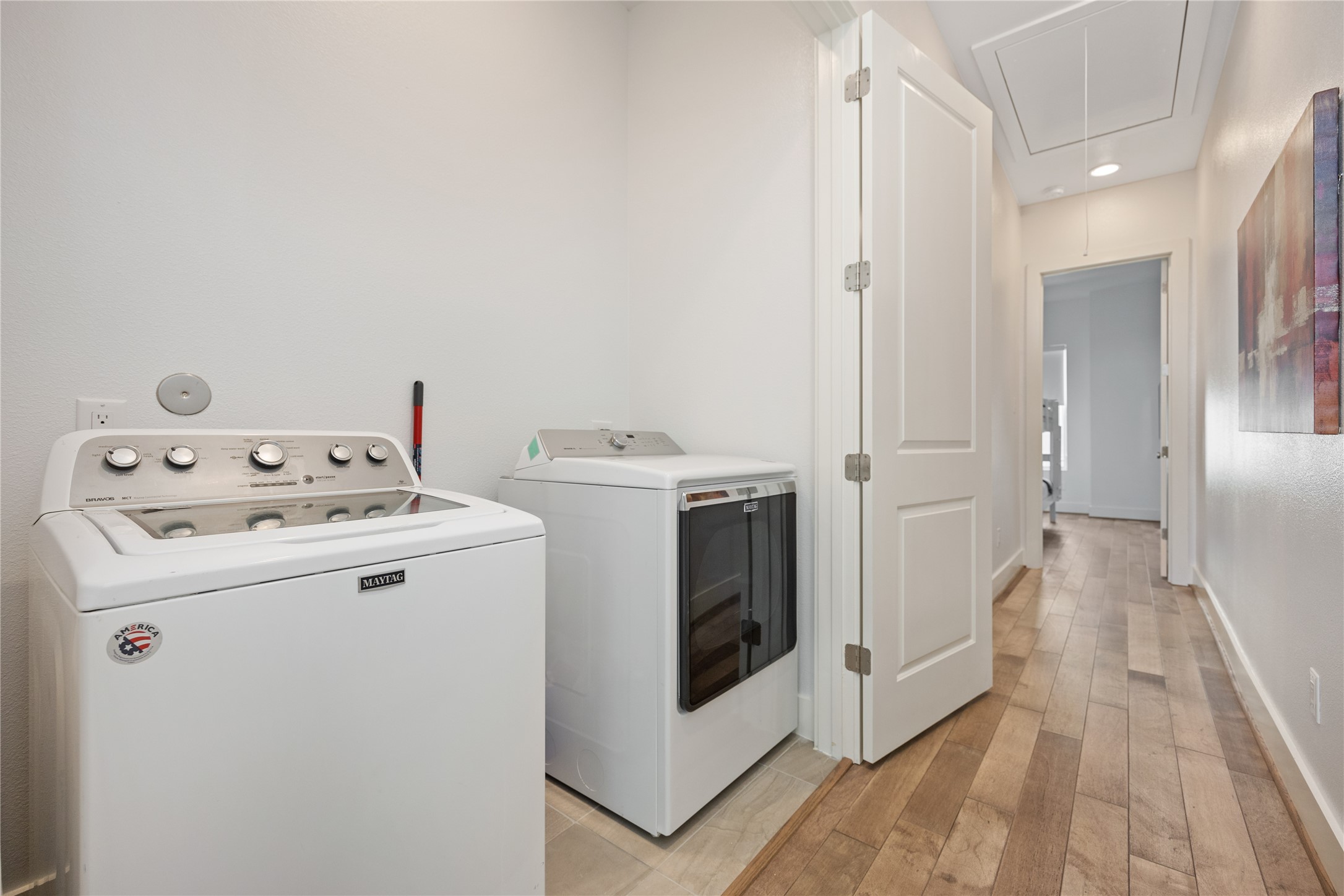 5914 Val Verde Street Houston, TX 77057 - Photo 17 of 25 a utility room with dryer and washer
