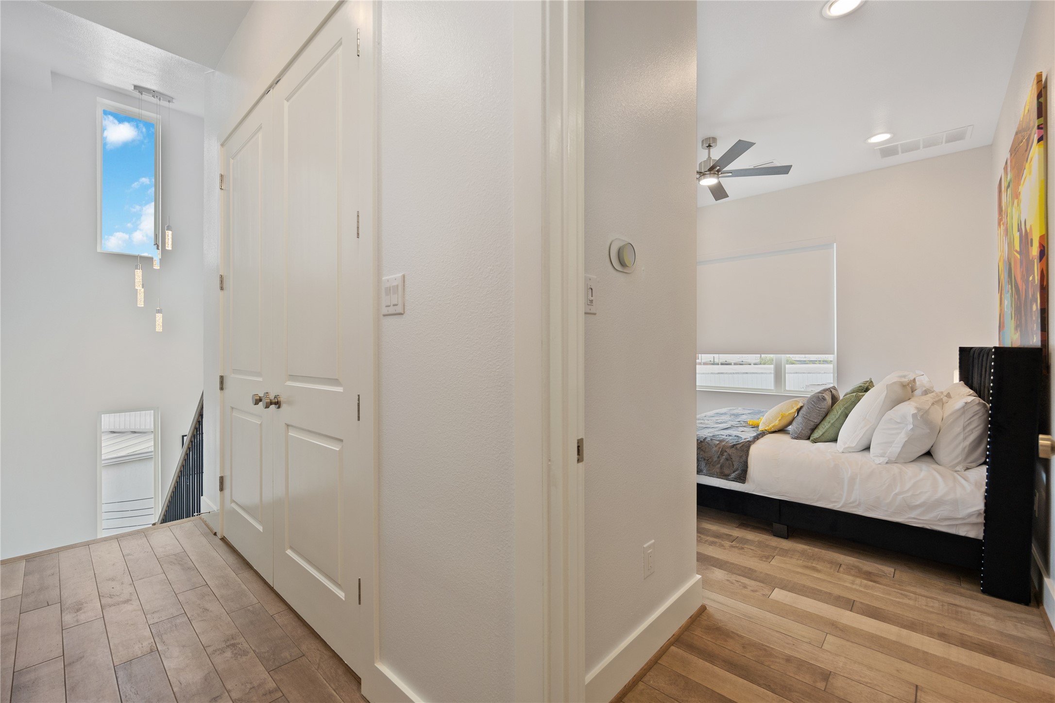 5914 Val Verde Street Houston, TX 77057 - Photo 20 of 25 a bedroom with furniture and a ceiling fan