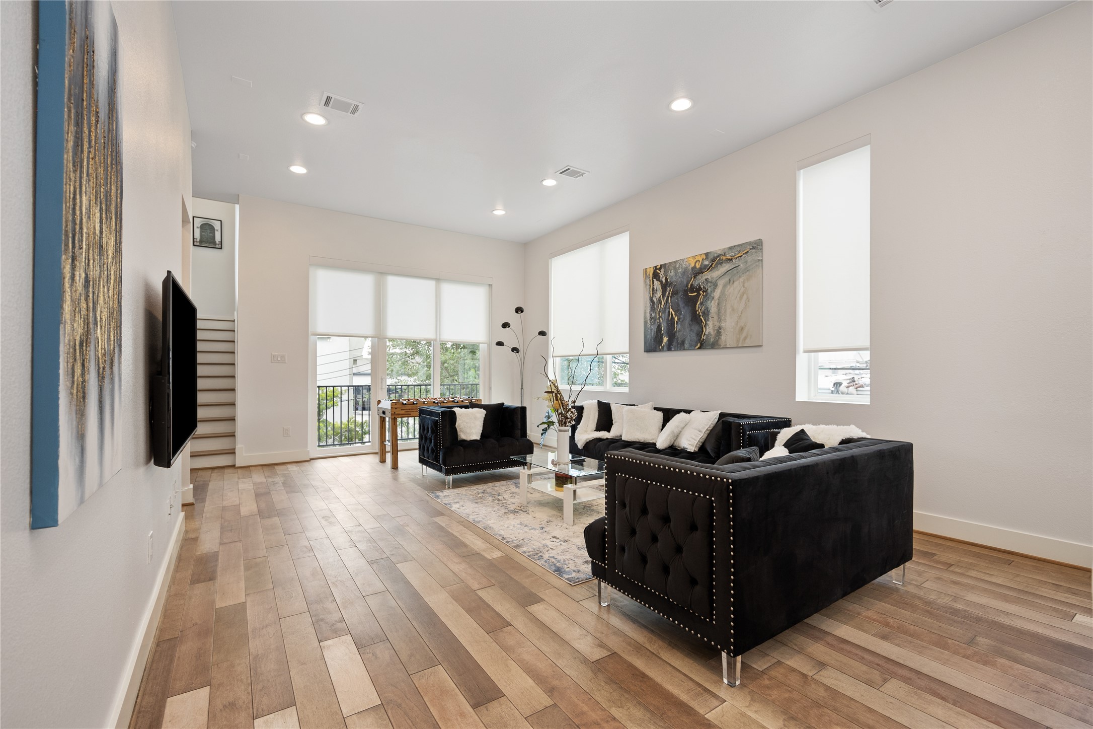 5914 Val Verde Street Houston, TX 77057 - Photo 2 of 25 a living room with furniture and a large window
