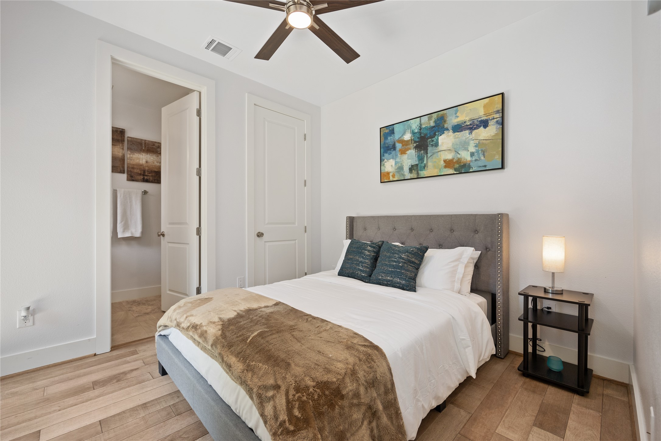 5914 Val Verde Street Houston, TX 77057 - Photo 5 of 25 a bedroom with bed and a night stand
