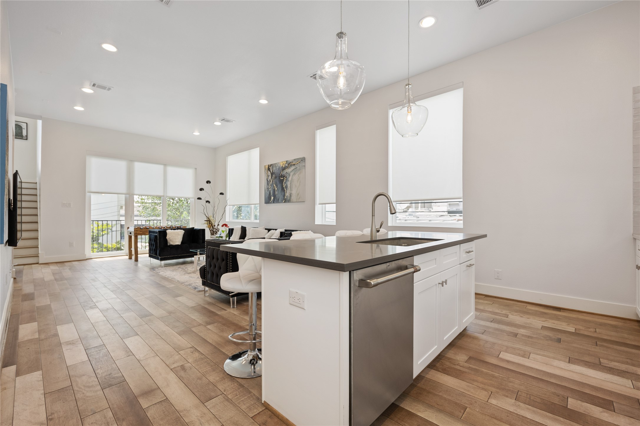 5914 Val Verde Street Houston, TX 77057 - Photo 9 of 25 a kitchen with a sink appliances and cabinets