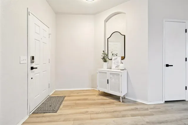 a open kitchen with sink stove and cabinets