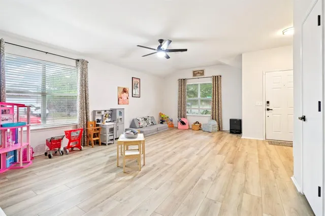 a bed room with a bed and furniture