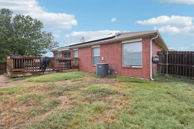 a view of roof deck with patio