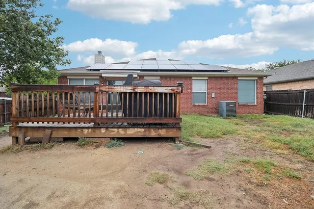 a view of swimming pool with sitting area