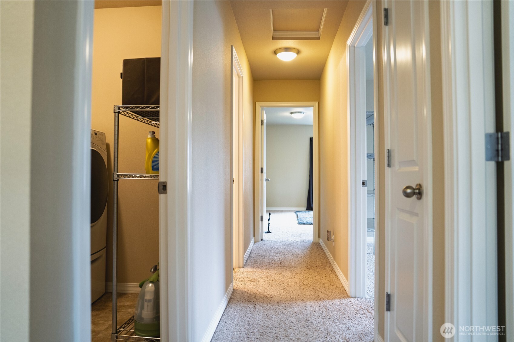 27661 McIntosh Loop Northeast Kingston, WA 98346 - Photo 20 of 34 a view of a hallway with wooden floor