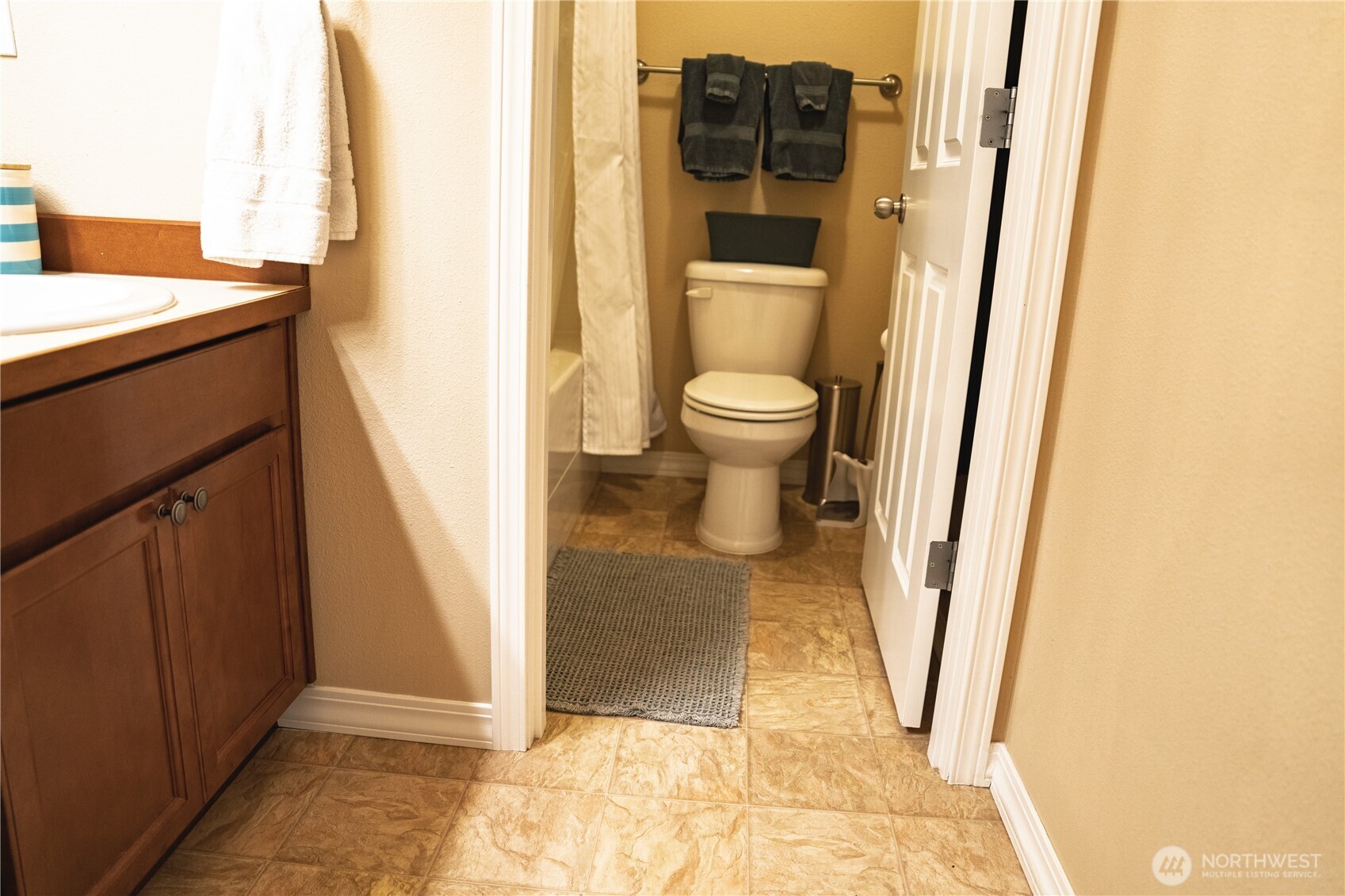 27661 McIntosh Loop Northeast Kingston, WA 98346 - Photo 26 of 34 a view of bathroom with a sink and toilet