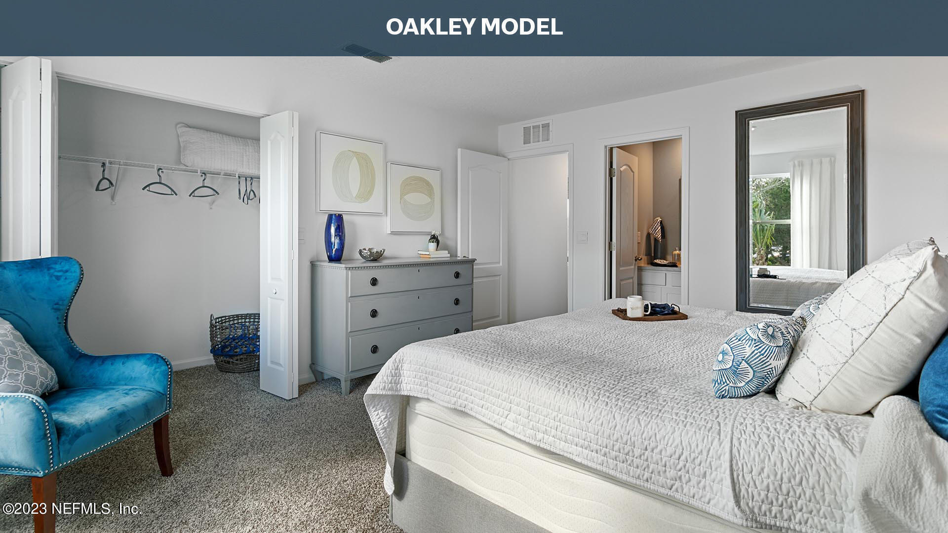 9175 Alpine Aster Road Jacksonville, FL 32256 - Photo 11 of 34 a spacious bedroom with a bed and a couch