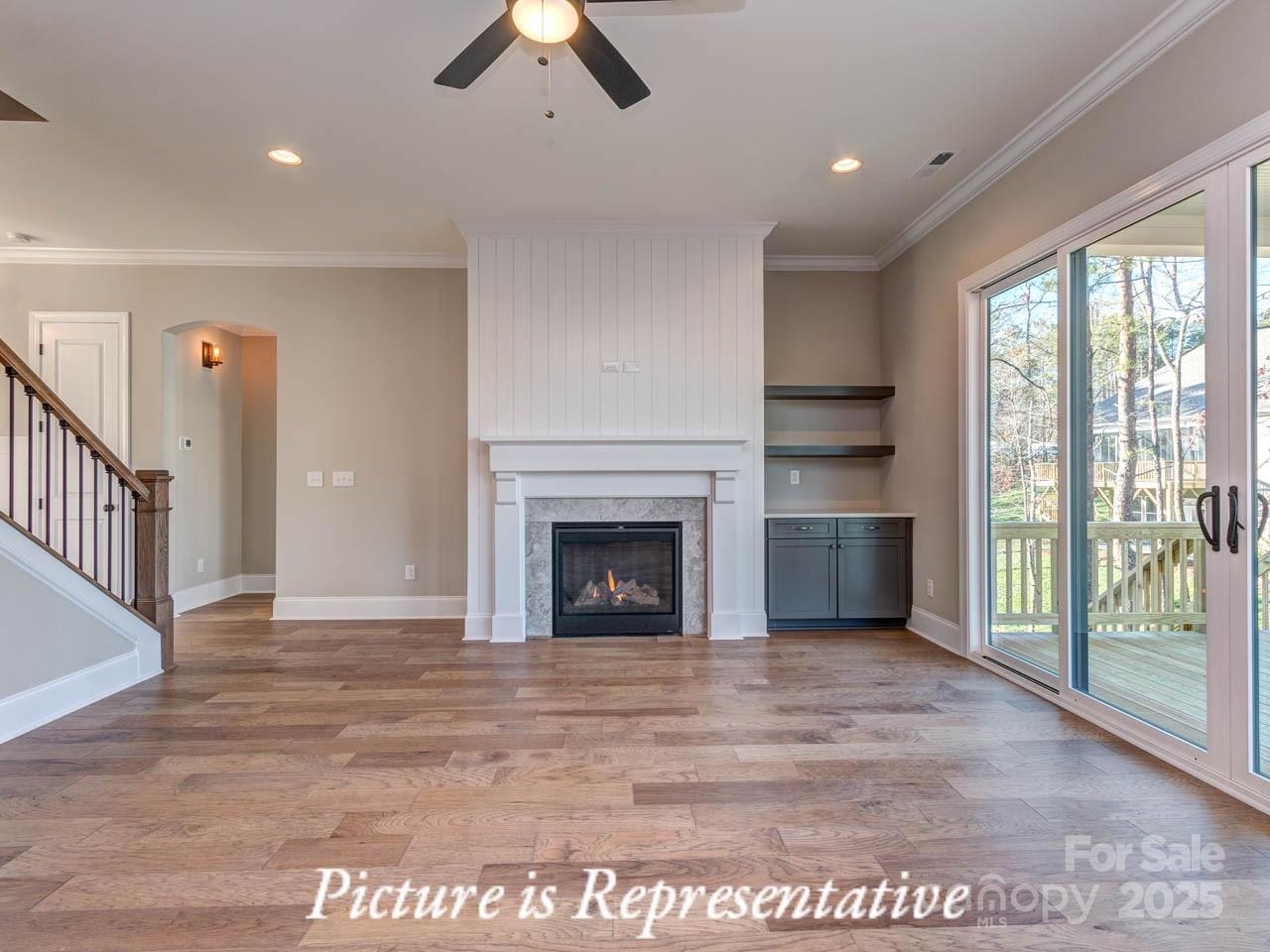 4238 Brushy Knoll York, SC 29745 - Photo 11 of 46 a view of an empty room with a window and a fireplace