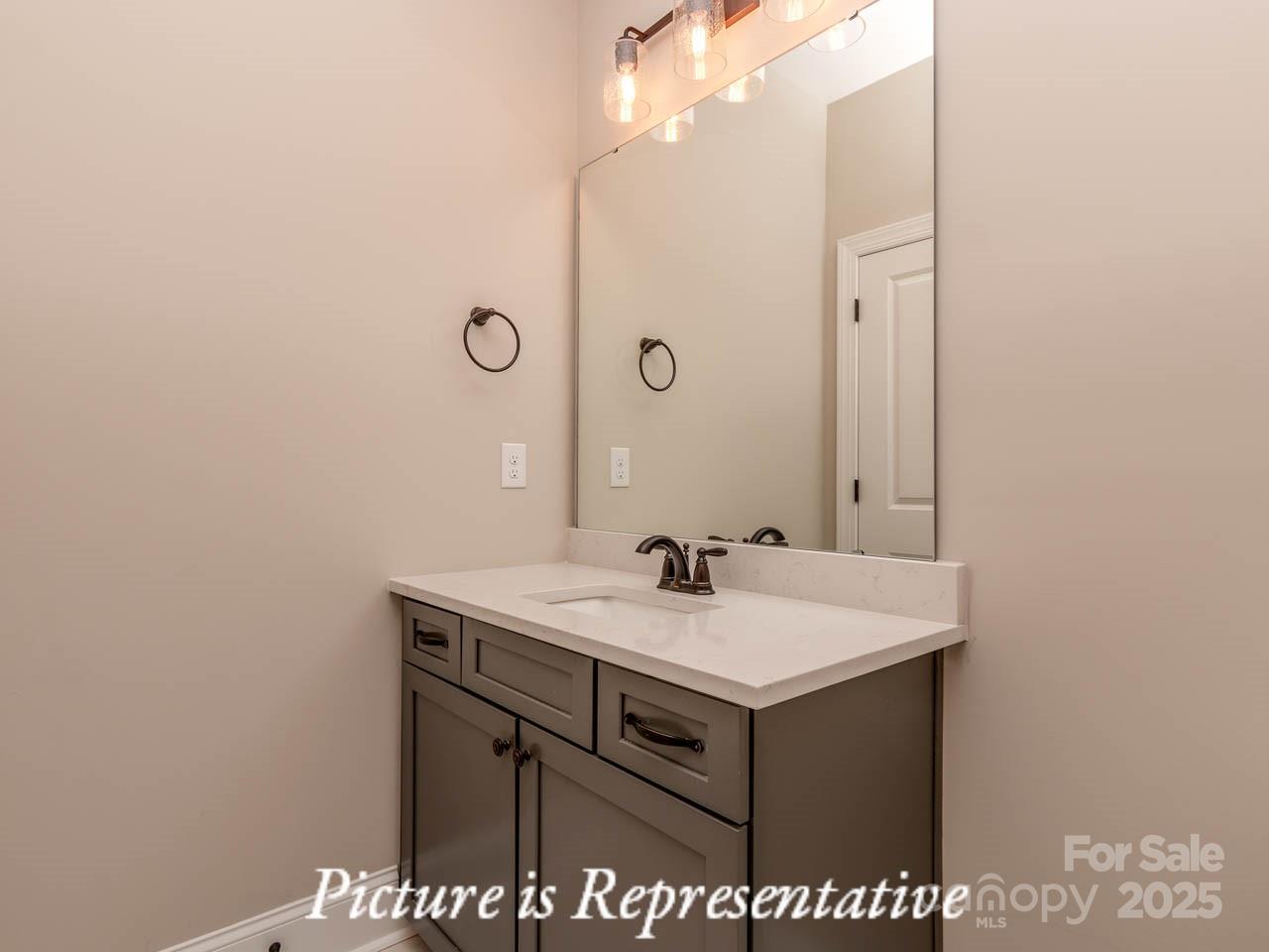 4238 Brushy Knoll York, SC 29745 - Photo 37 of 46 a view of bathroom with a sink and mirror