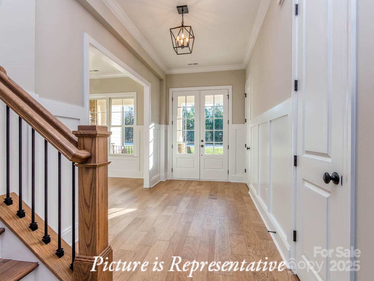 4238 Brushy Knoll York, SC 29745 - Photo 6 of 46 a view of an entryway with wooden floor