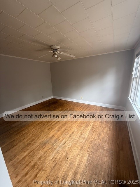 99 Susan Street Clinton, NC 28328 - Photo 2 of 10 a view of a room with wooden floor