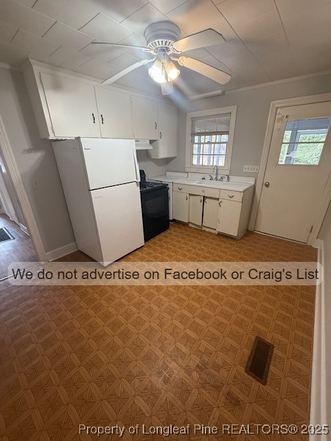 99 Susan Street Clinton, NC 28328 - Photo 4 of 10 a view of a livingroom with furniture and windows