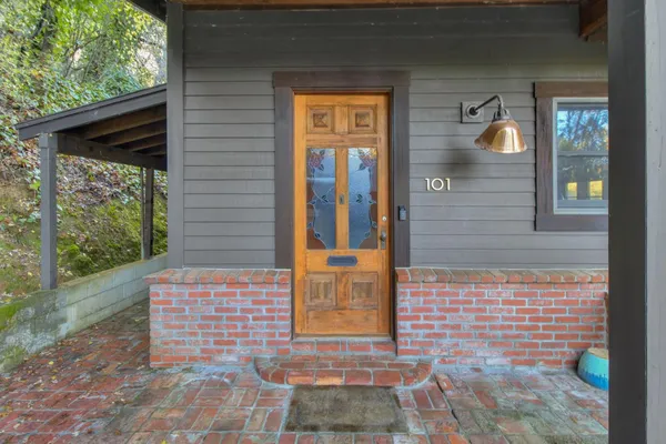 a view of a balcony and door