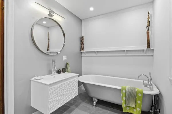 a room with wooden floor and a table