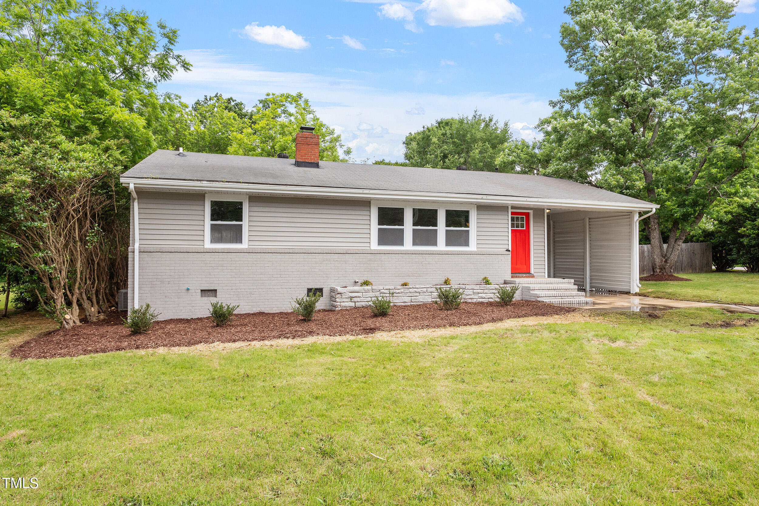 3325 Old Buffalo Road Raleigh, NC 27604 - Photo 1 of 26 a front view of house with yard and seating area