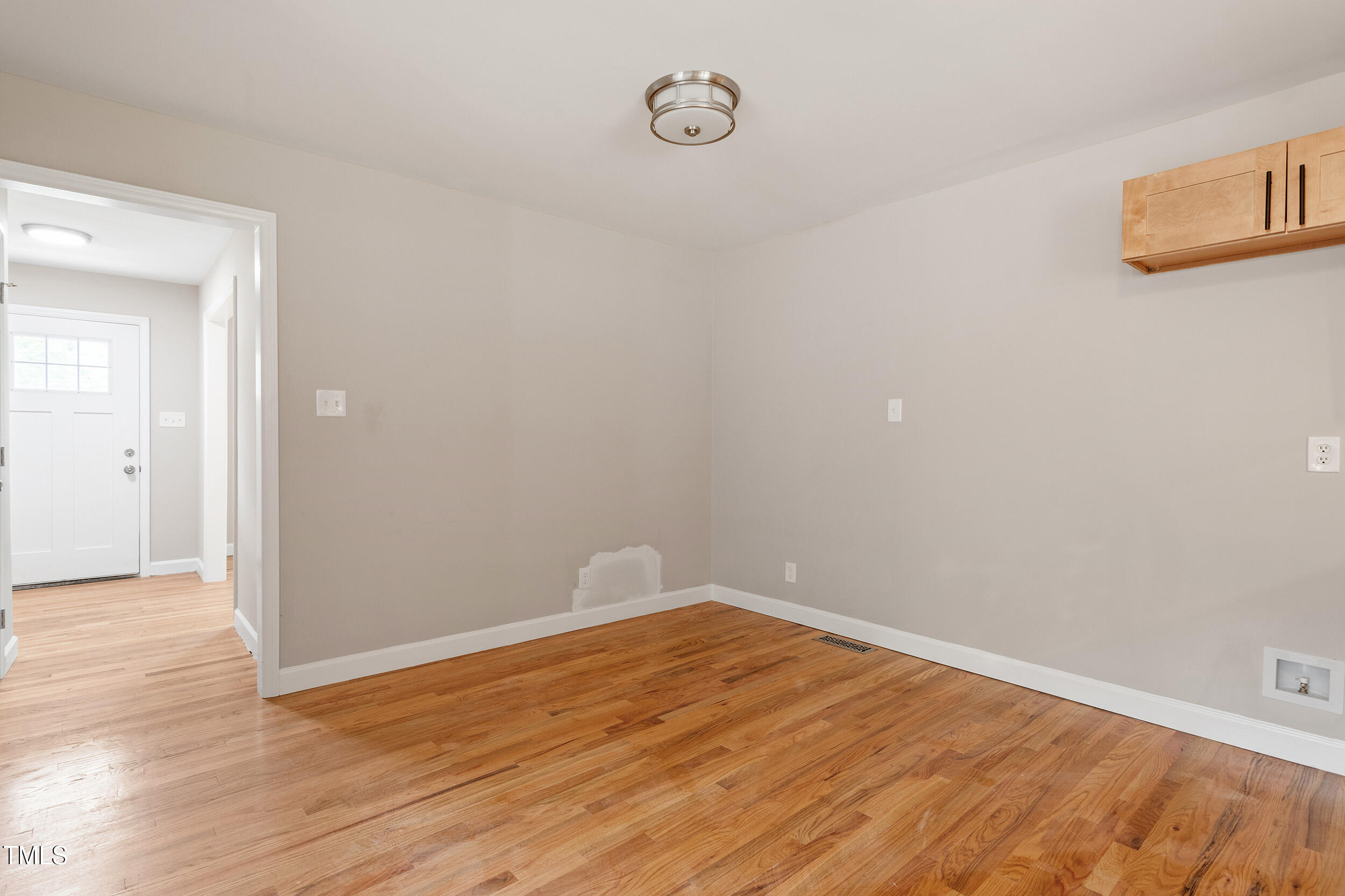 3325 Old Buffalo Road Raleigh, NC 27604 - Photo 11 of 26 a view of empty room with wooden floor