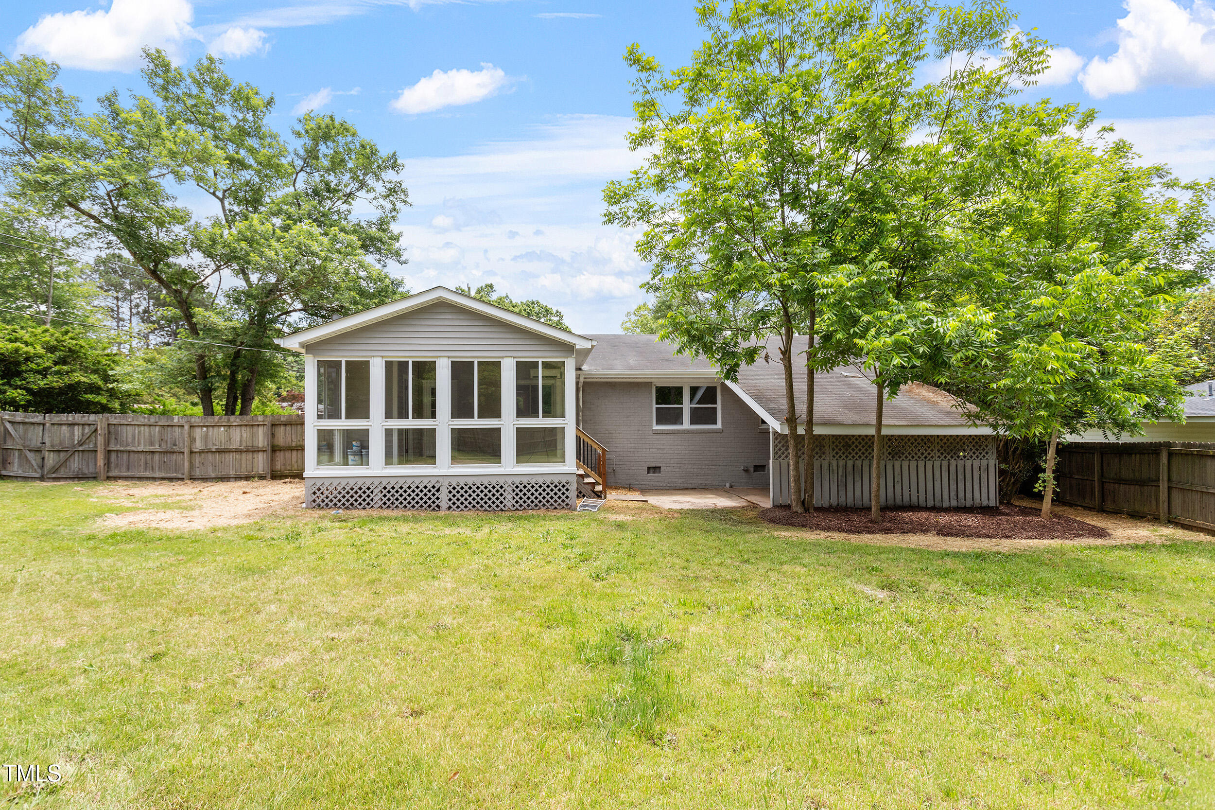 3325 Old Buffalo Road Raleigh, NC 27604 - Photo 25 of 26 a view of a house with a yard and large trees