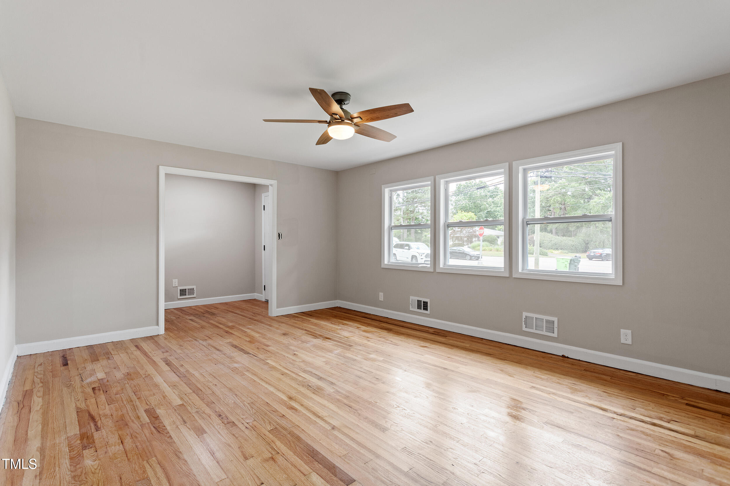 3325 Old Buffalo Road Raleigh, NC 27604 - Photo 5 of 26 a view of an empty room with a window