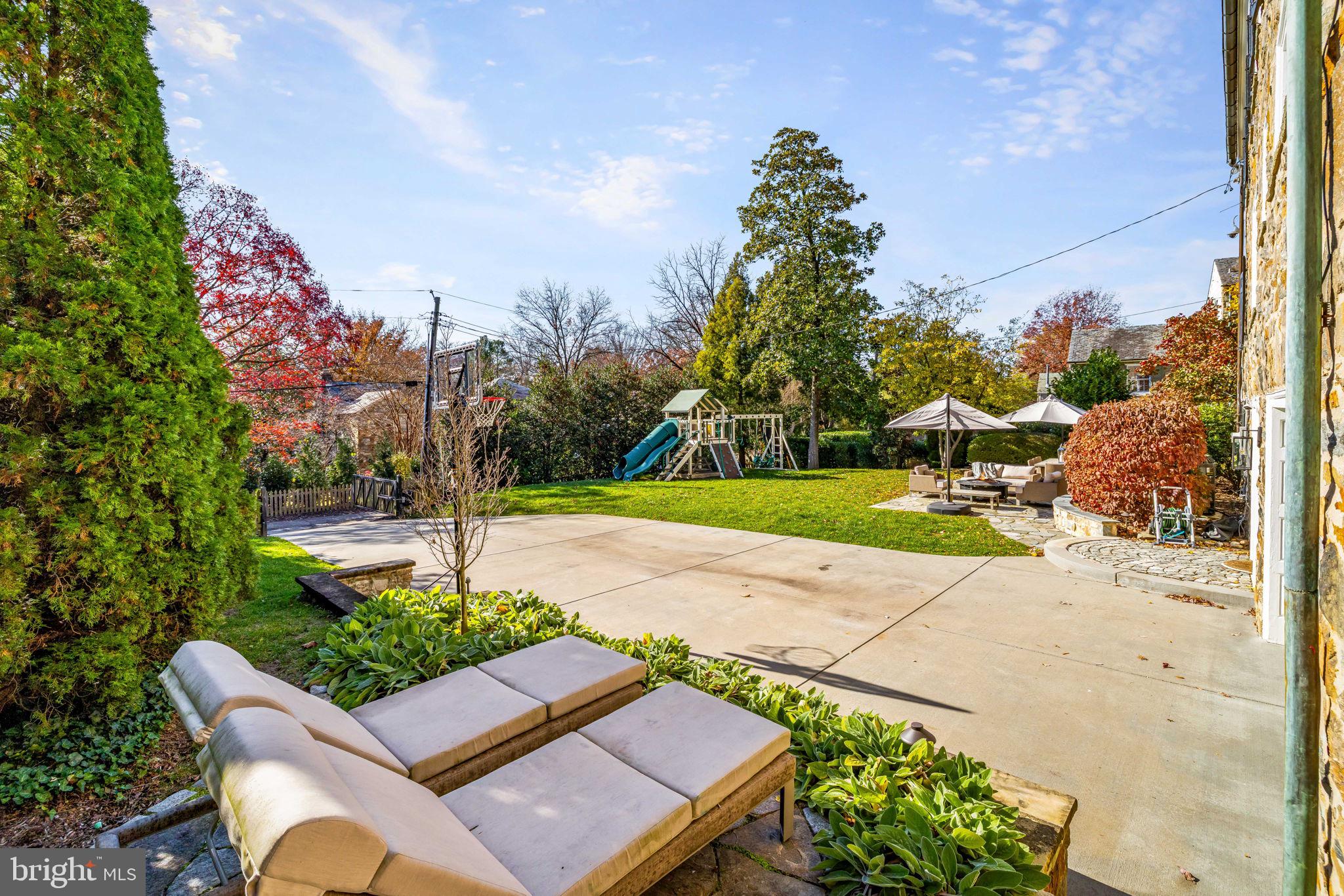 115 Tunbridge Road Baltimore, MD 21212 - Photo 4 of 13 a view of backyard with outdoor seating and green space
