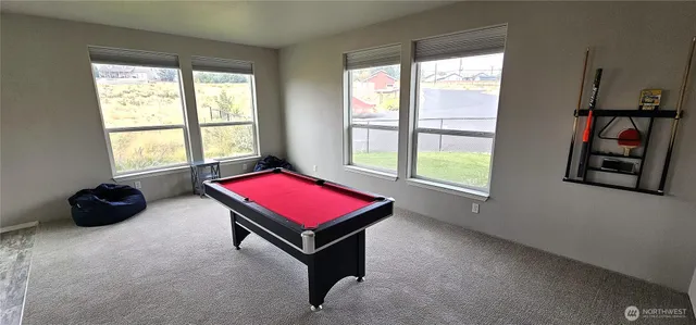 a room with furniture and a window