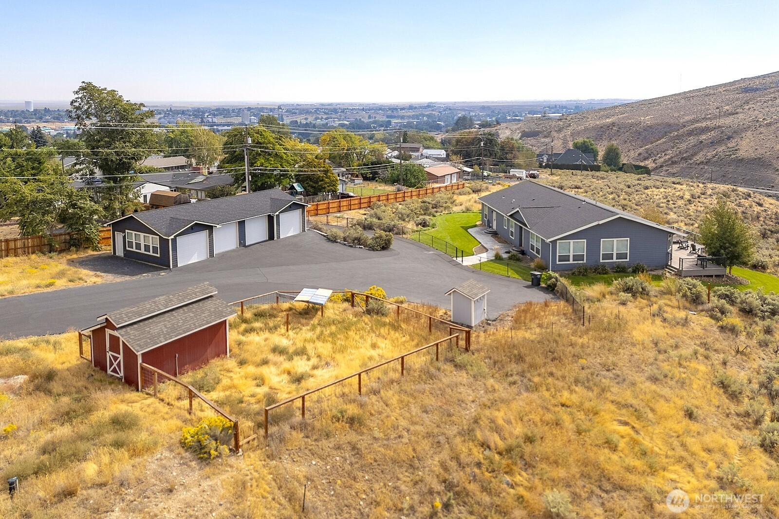 435 Maringo Road Ephrata, WA 98823 - Photo 2 of 40 an aerial view of residential houses with outdoor space