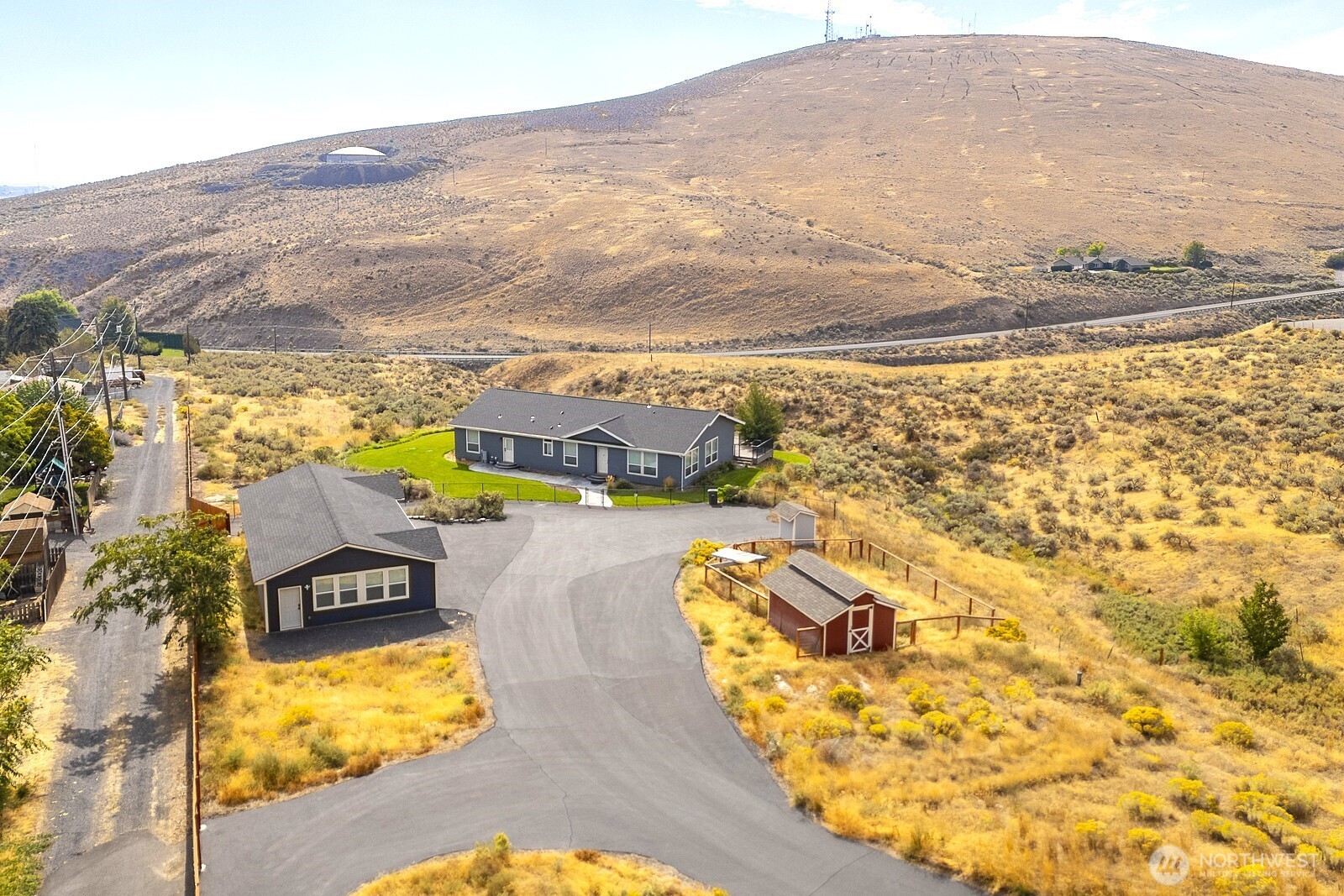 435 Maringo Road Ephrata, WA 98823 - Photo 3 of 40 a view of a swimming pool with a lake view