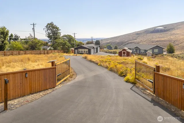 a view of a swimming pool with a lounge chair