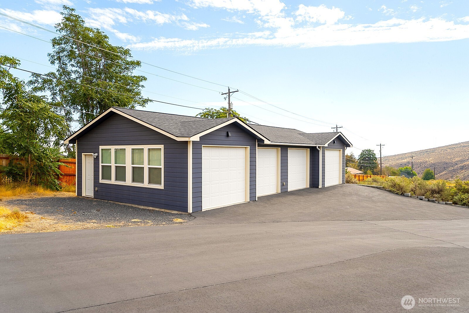 435 Maringo Road Ephrata, WA 98823 - Photo 10 of 40 a view of front of house with a yard and large tree
