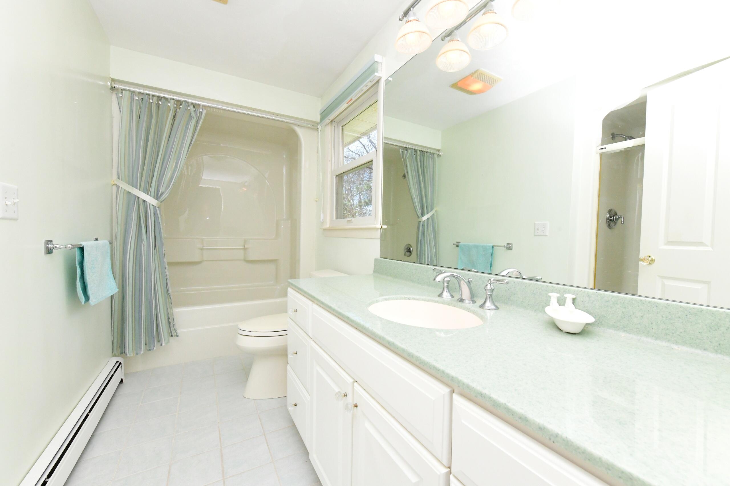 25 Andrew Road Sagamore Beach, MA 02562 - Photo 15 of 45 a bathroom with a granite countertop sink toilet and shower