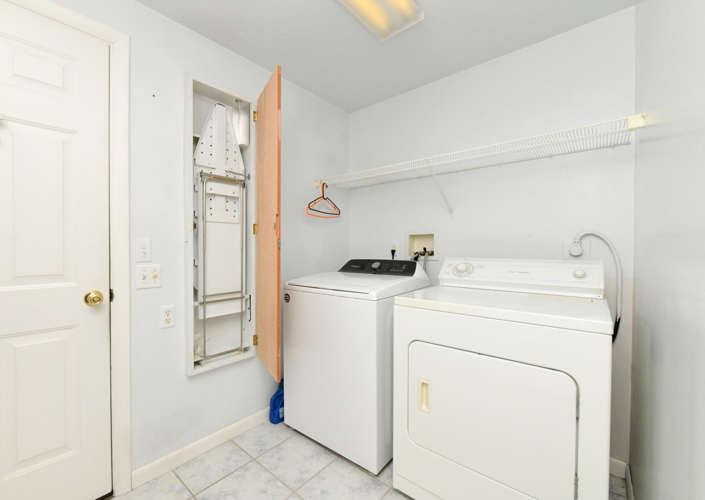 25 Andrew Road Sagamore Beach, MA 02562 - Photo 24 of 45 a view of storage and utility room with washer and dryer