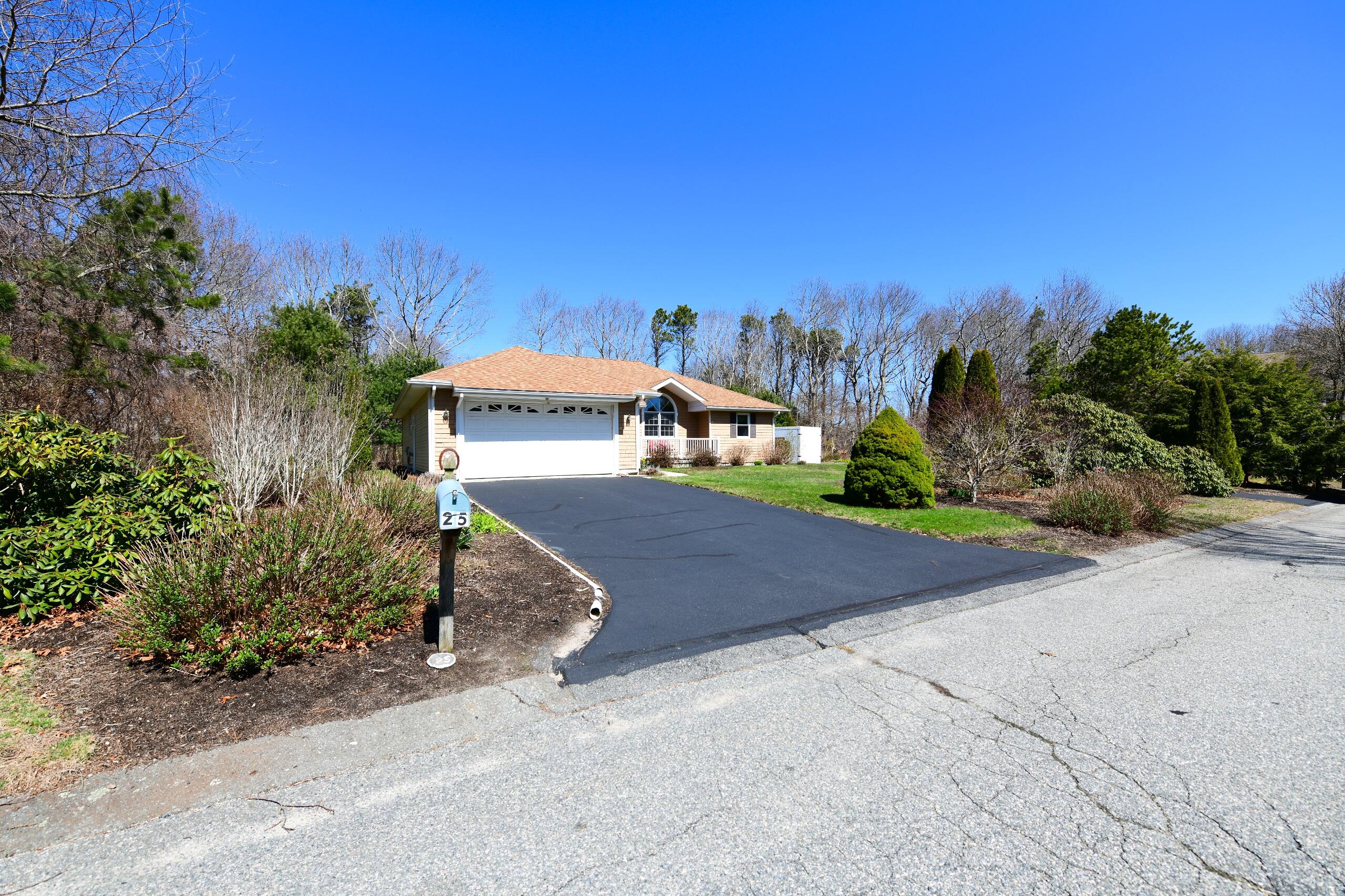 25 Andrew Road Sagamore Beach, MA 02562 - Photo 30 of 45 a view of a street with houses