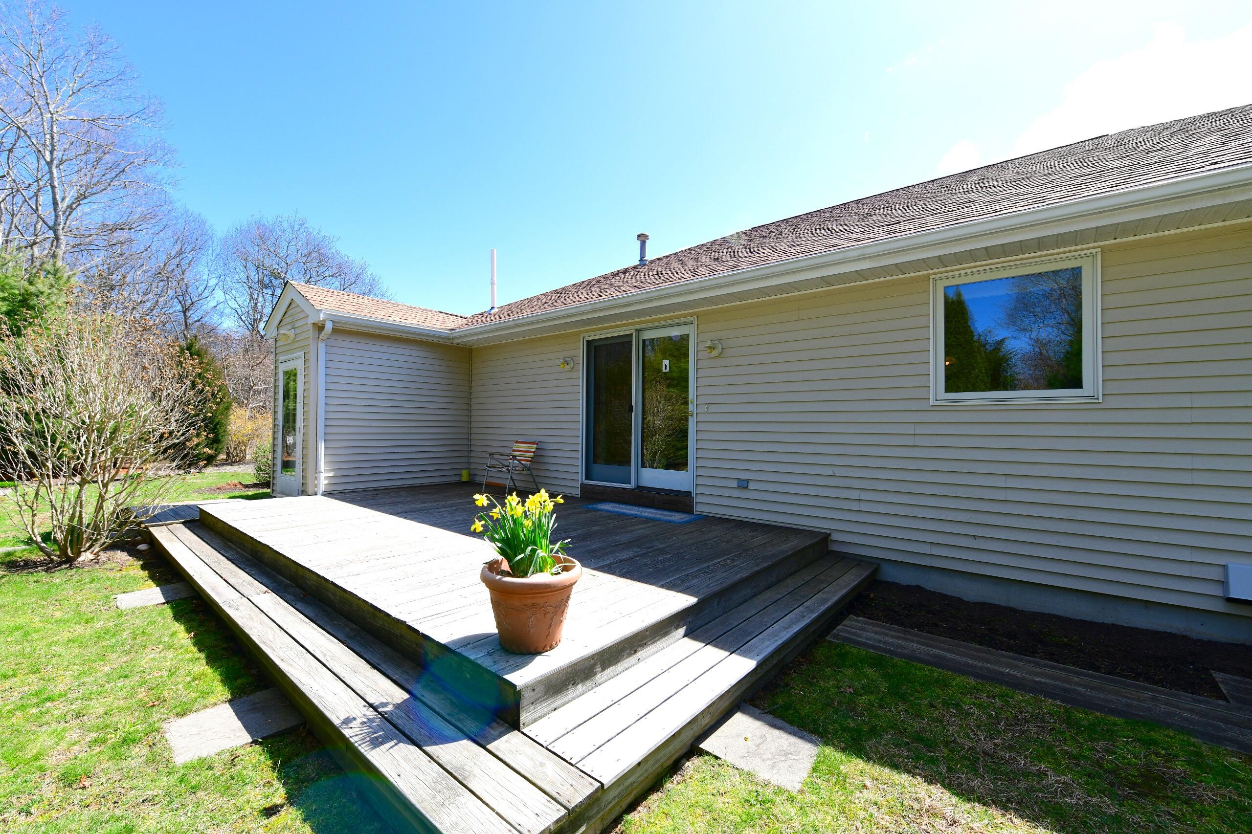 25 Andrew Road Sagamore Beach, MA 02562 - Photo 40 of 45 a front view of house with yard