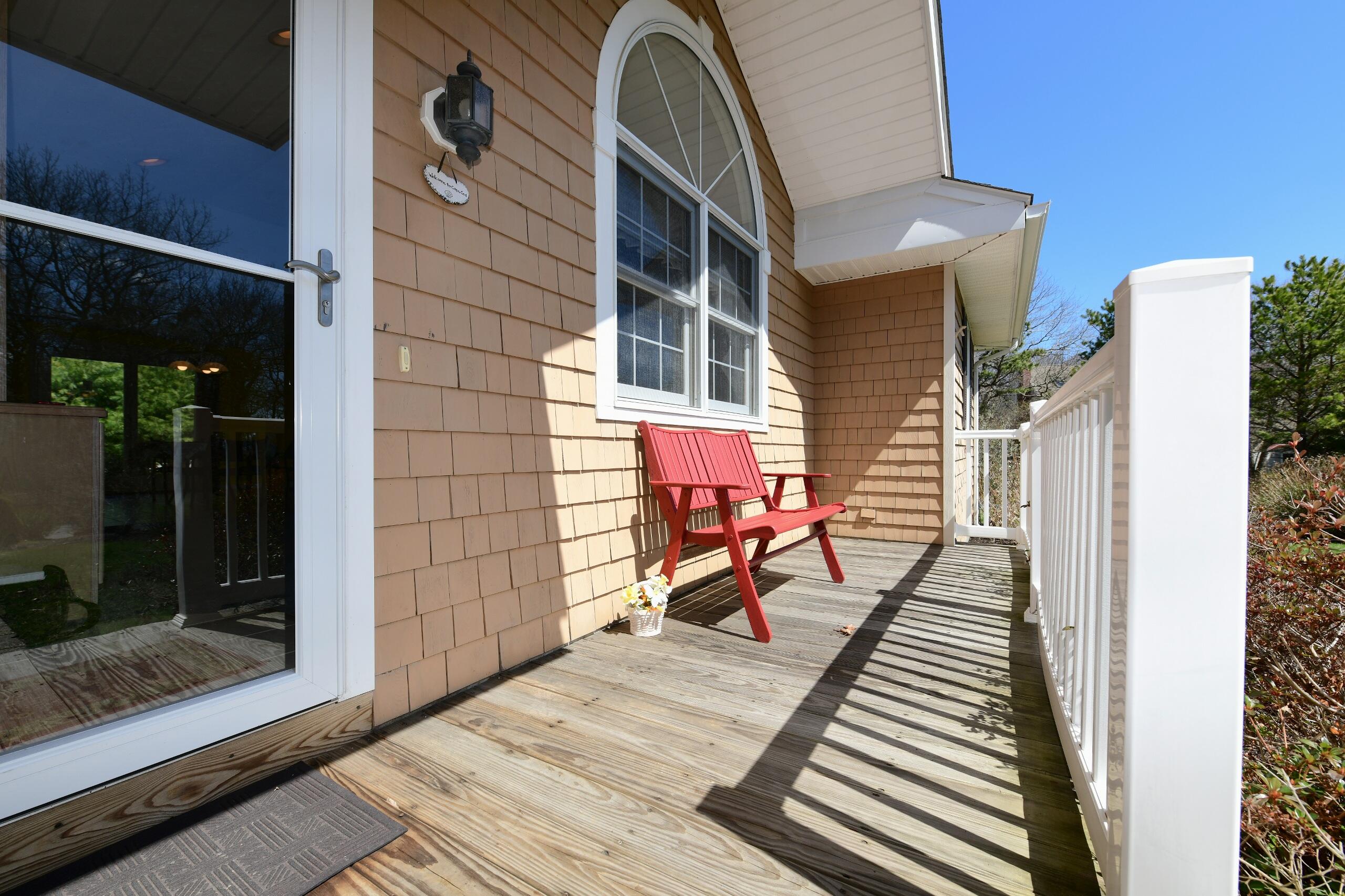 25 Andrew Road Sagamore Beach, MA 02562 - Photo 42 of 45 a view of a balcony with chairs