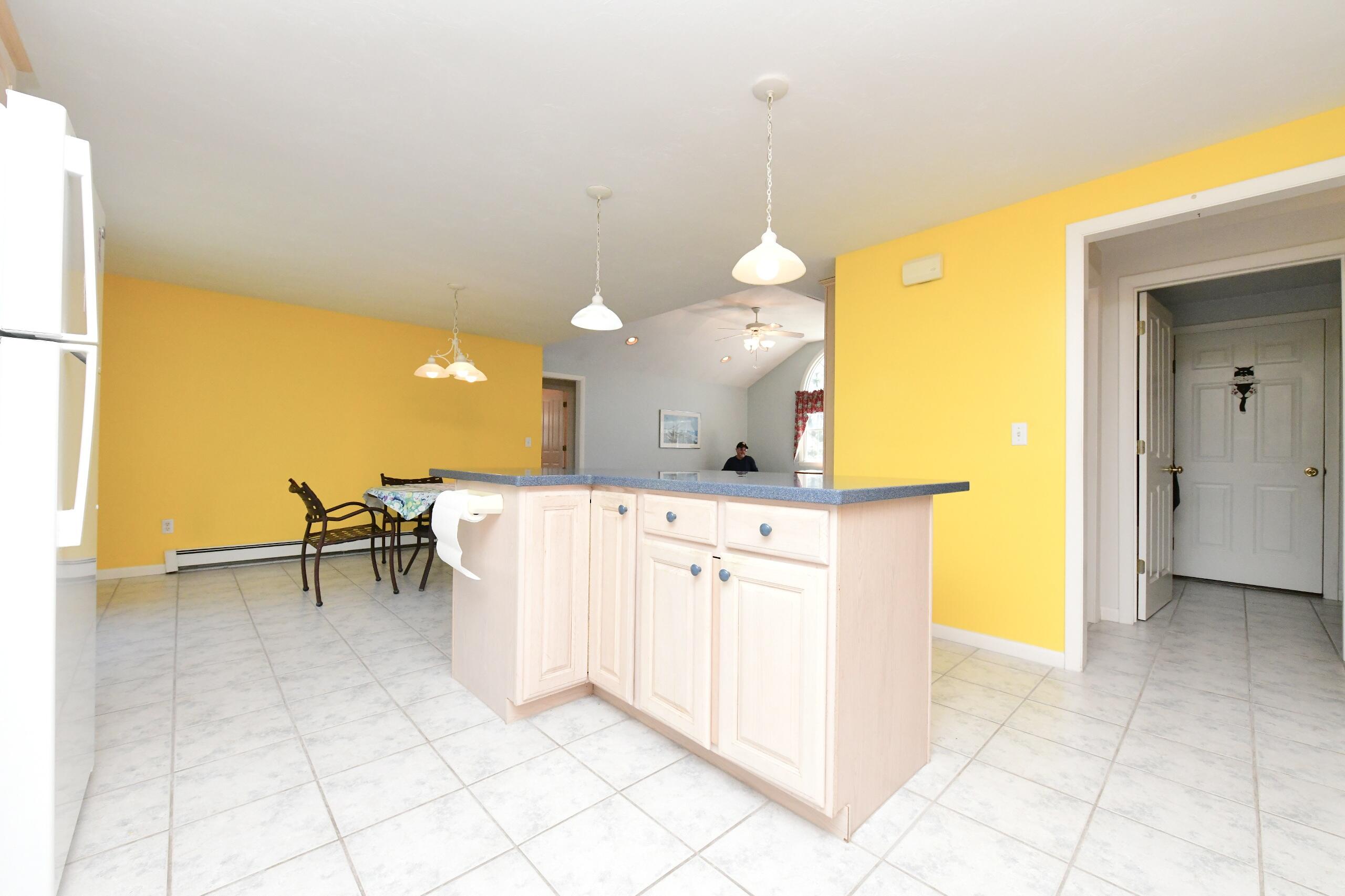 25 Andrew Road Sagamore Beach, MA 02562 - Photo 9 of 45 a kitchen with a sink cabinets and window