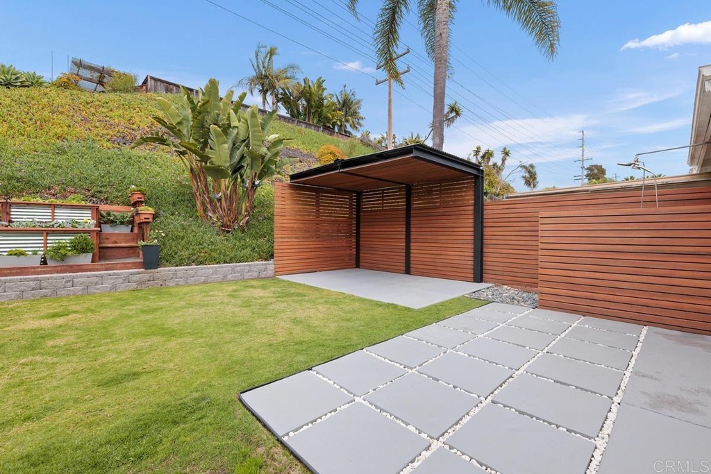 742 Snapdragon Street Encinitas, CA 92024 - Photo 15 of 22 a view of a backyard of the house