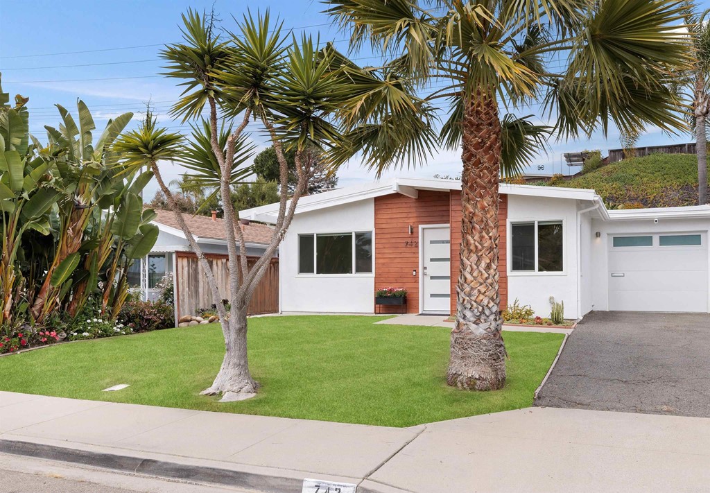 742 Snapdragon Street Encinitas, CA 92024 - Photo 2 of 22 a front view of house with yard and green space