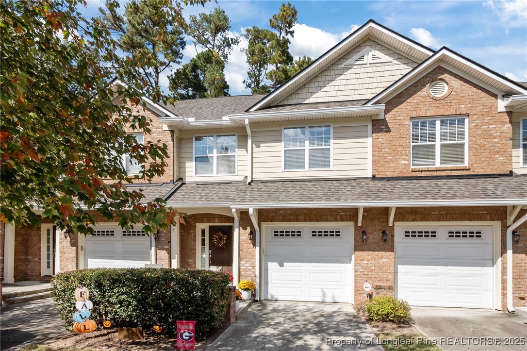 47 Abernathy Drive, Unit 13 Chapel Hill, NC 27517 - Photo 1 of 46 a front view of a house with plants