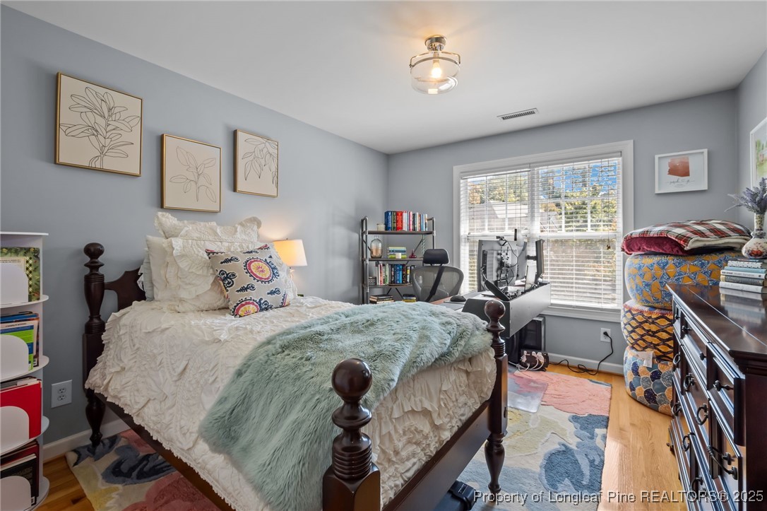 47 Abernathy Drive, Unit 13 Chapel Hill, NC 27517 - Photo 27 of 46 a bedroom with bed and furniture