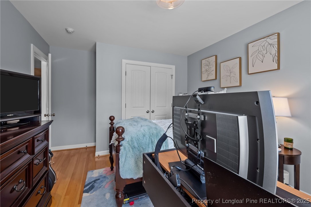47 Abernathy Drive, Unit 13 Chapel Hill, NC 27517 - Photo 28 of 46 a room with furniture and a flat screen tv