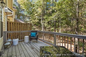 47 Abernathy Drive, Unit 13 Chapel Hill, NC 27517 - Photo 33 of 46 a view of a wooden deck with furniture
