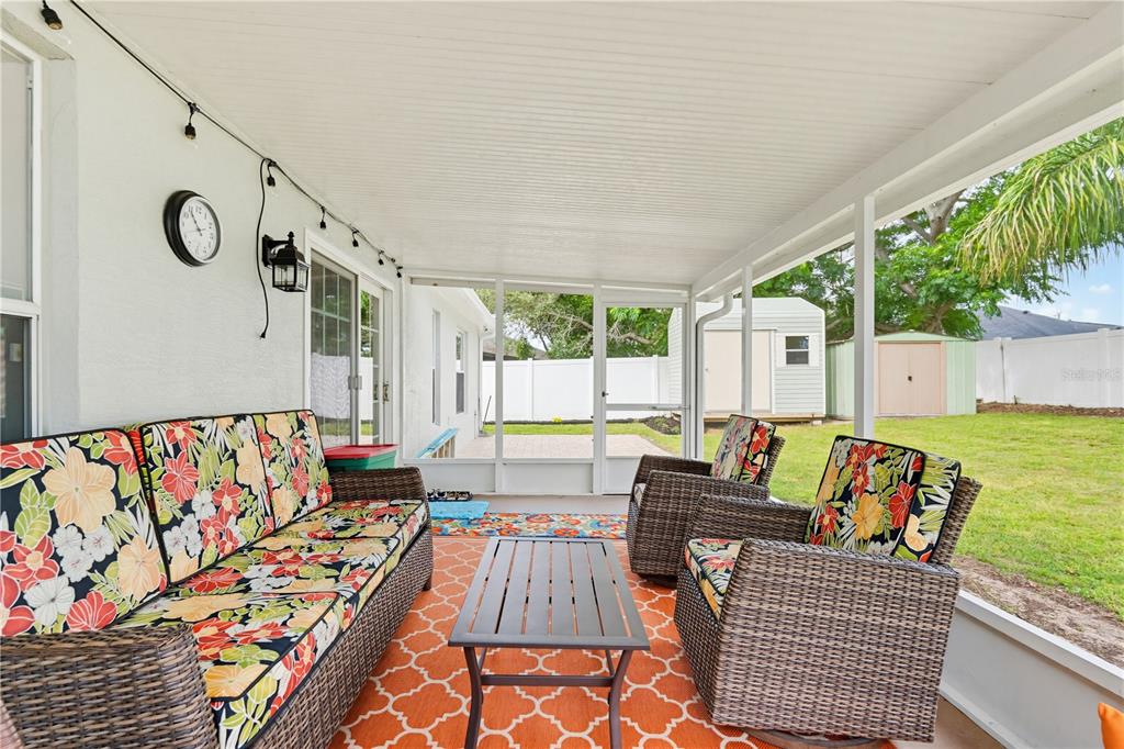 3497 Chadwick Avenue Spring Hill, FL 34609 - Photo 36 of 47 a bedroom with furniture and a large window