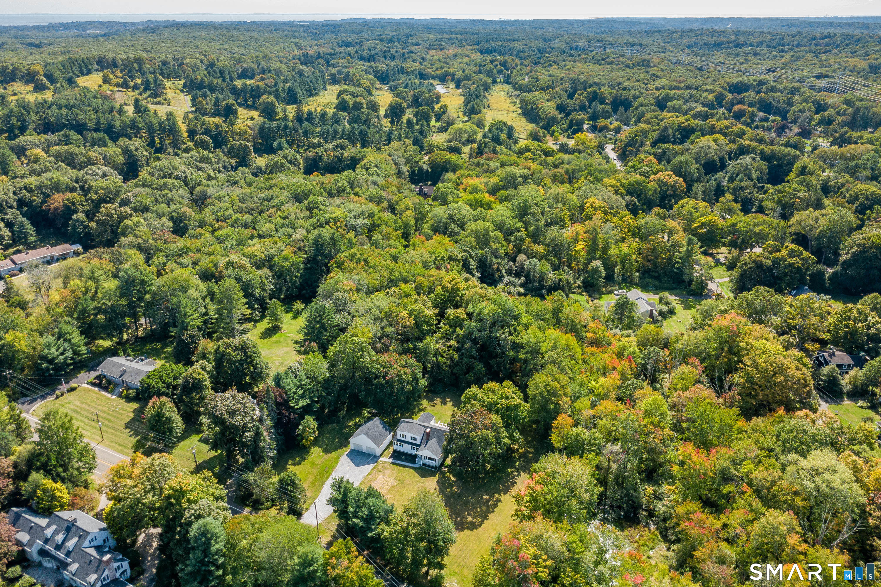 34 Rimmon Road Woodbridge, CT 06525 - Photo 40 of 40 Sweeping aerial view highlighting the property's setting and surrounding landscape.