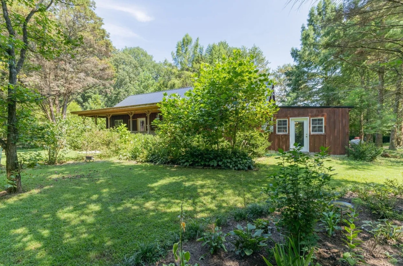 233 Taylor Lake Road Morrison, TN 37357 - Photo 31 of 51 a view of a house with a yard