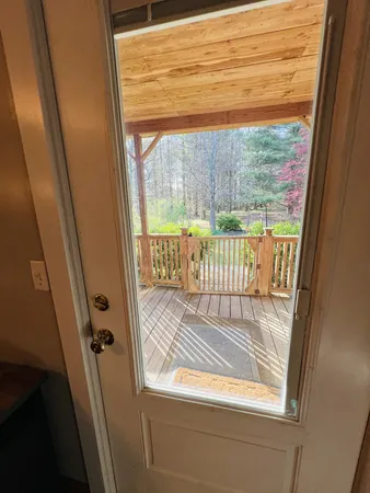 a view of a yard with a tree