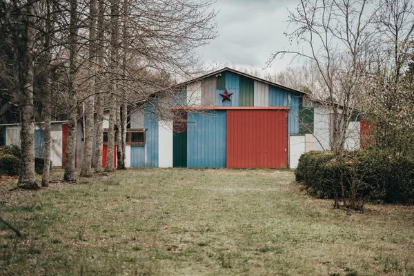 a house with trees in front of it