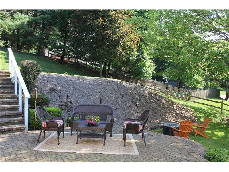 165 Ridgeview Drive Wexford, PA 15090 - Photo 23 of 25 Patio/Deck. A stone patio that provides lots of privacy. The fire pit is not built-in and sellers plan to take it with them.