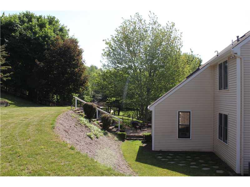 165 Ridgeview Drive Wexford, PA 15090 - Photo 24 of 25 Yard/Garden. Upper level yard is an ideal space to play games or put a swing set!