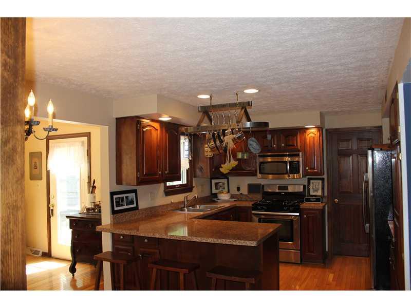 Kitchen. Counter tops installed in 2011 and all appliances replaced as well in 2011 to stainless steel.