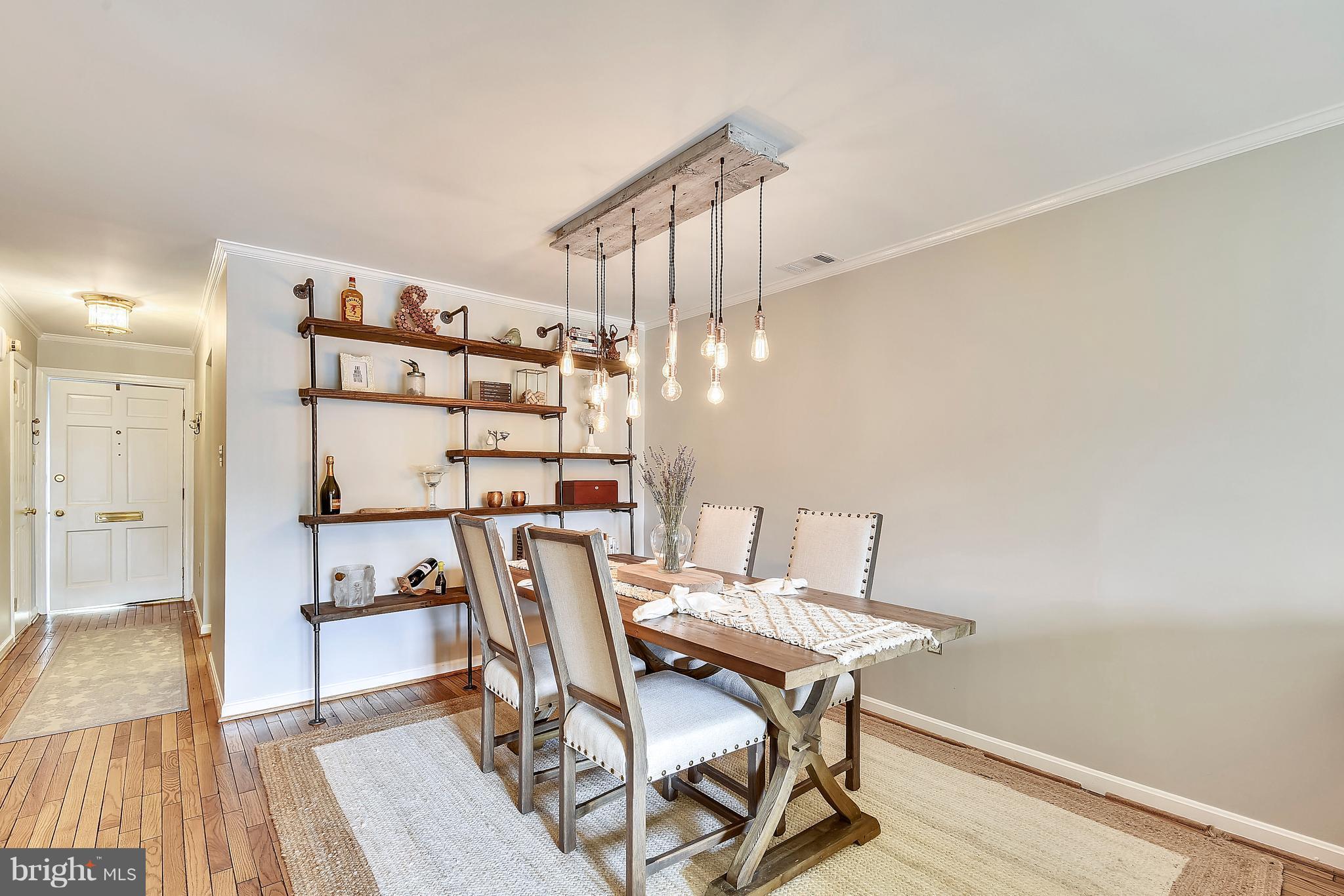 320 Commerce Street Alexandria, VA 22314 - Photo 14 of 30 Dining Room w/Custom Metal Shelving